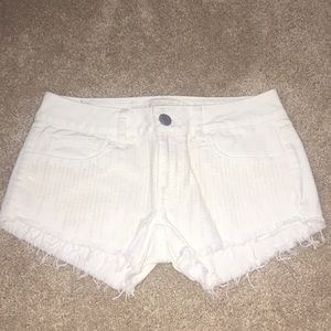 White sequin jean shorts